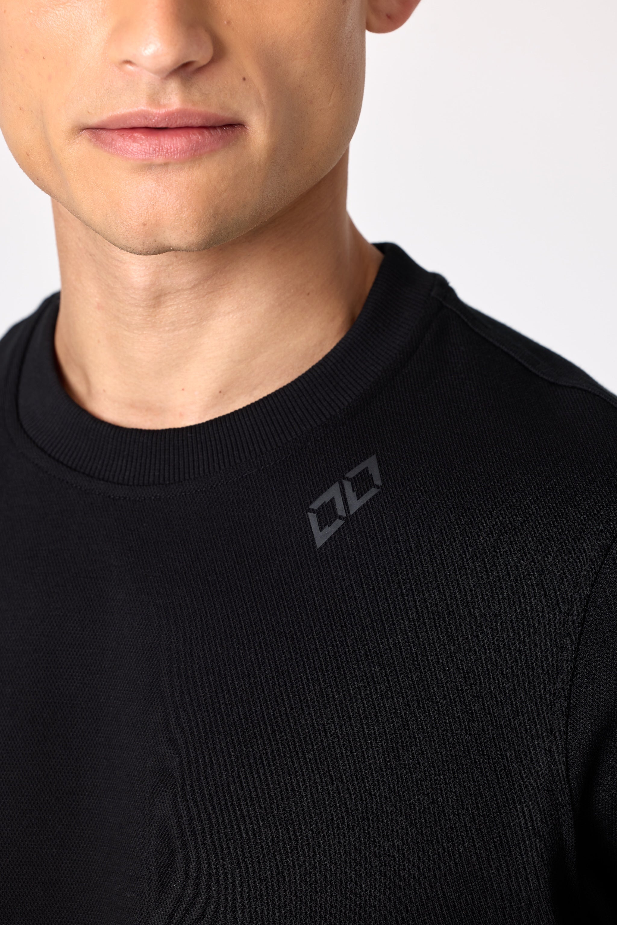Double Black Après ‘83 Ribbed Tee in black logo detail