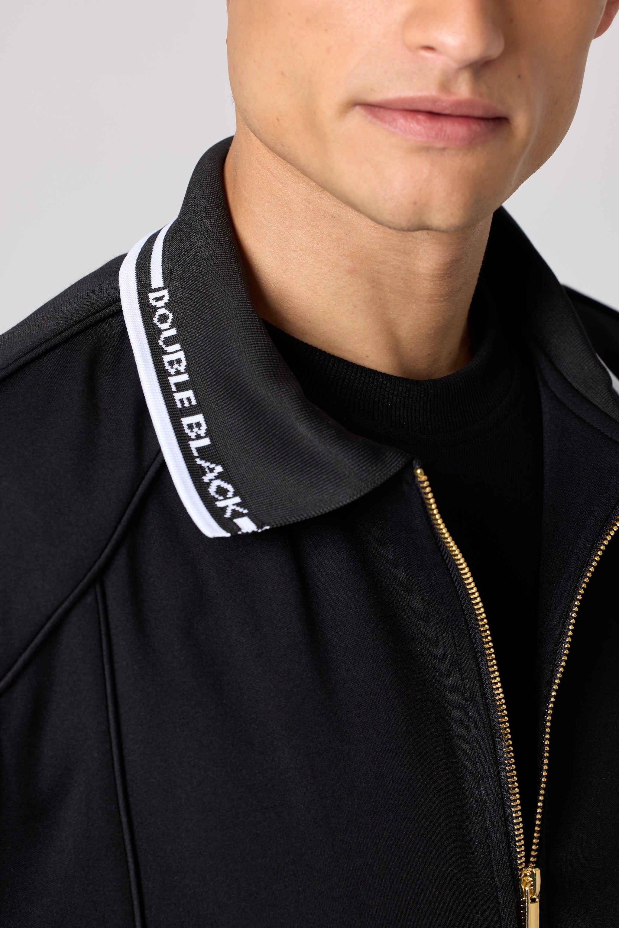 Double Black Après ‘83 Track Jacket in black collar detail