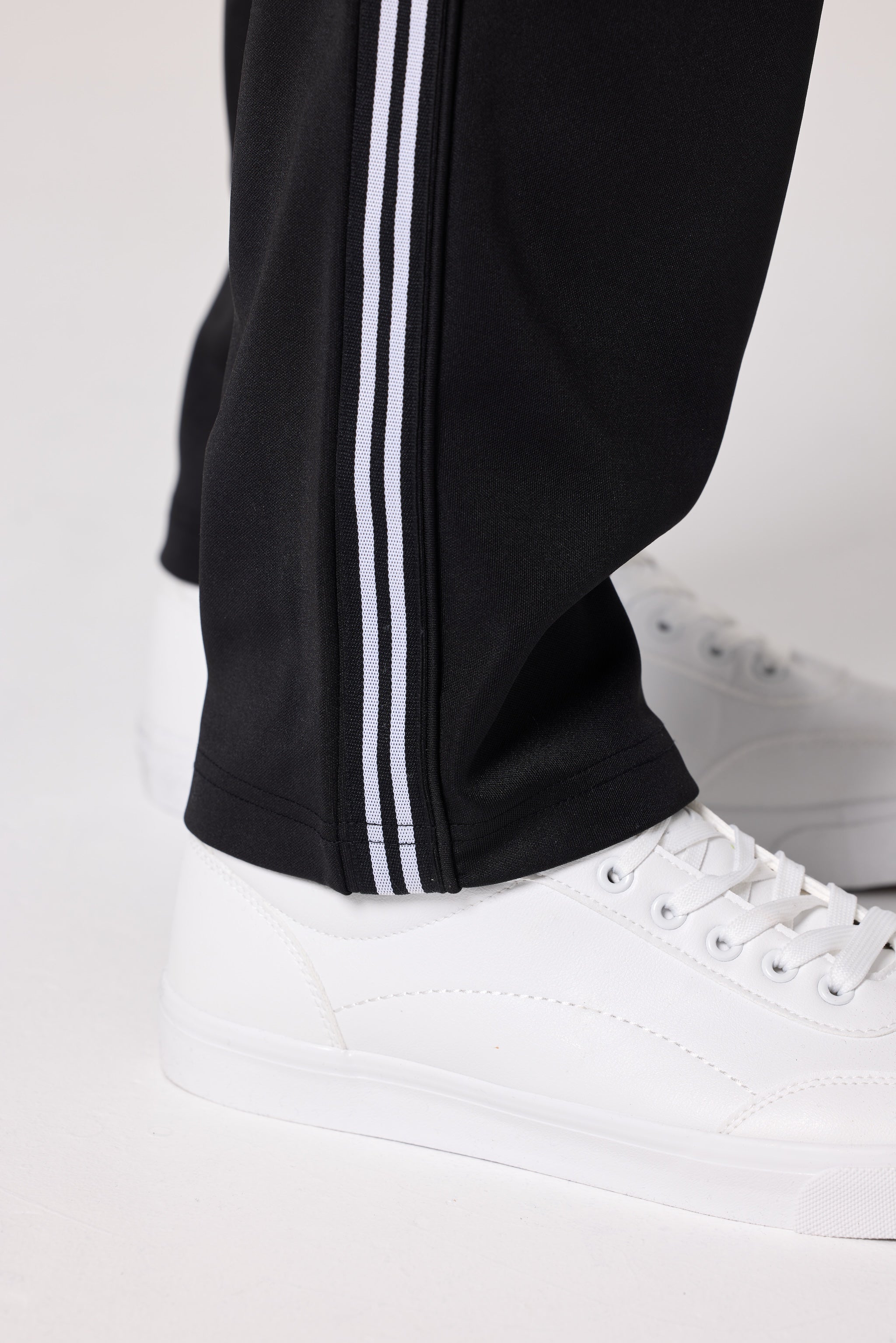 Double Black Après ‘83 Striped Track Pant in black