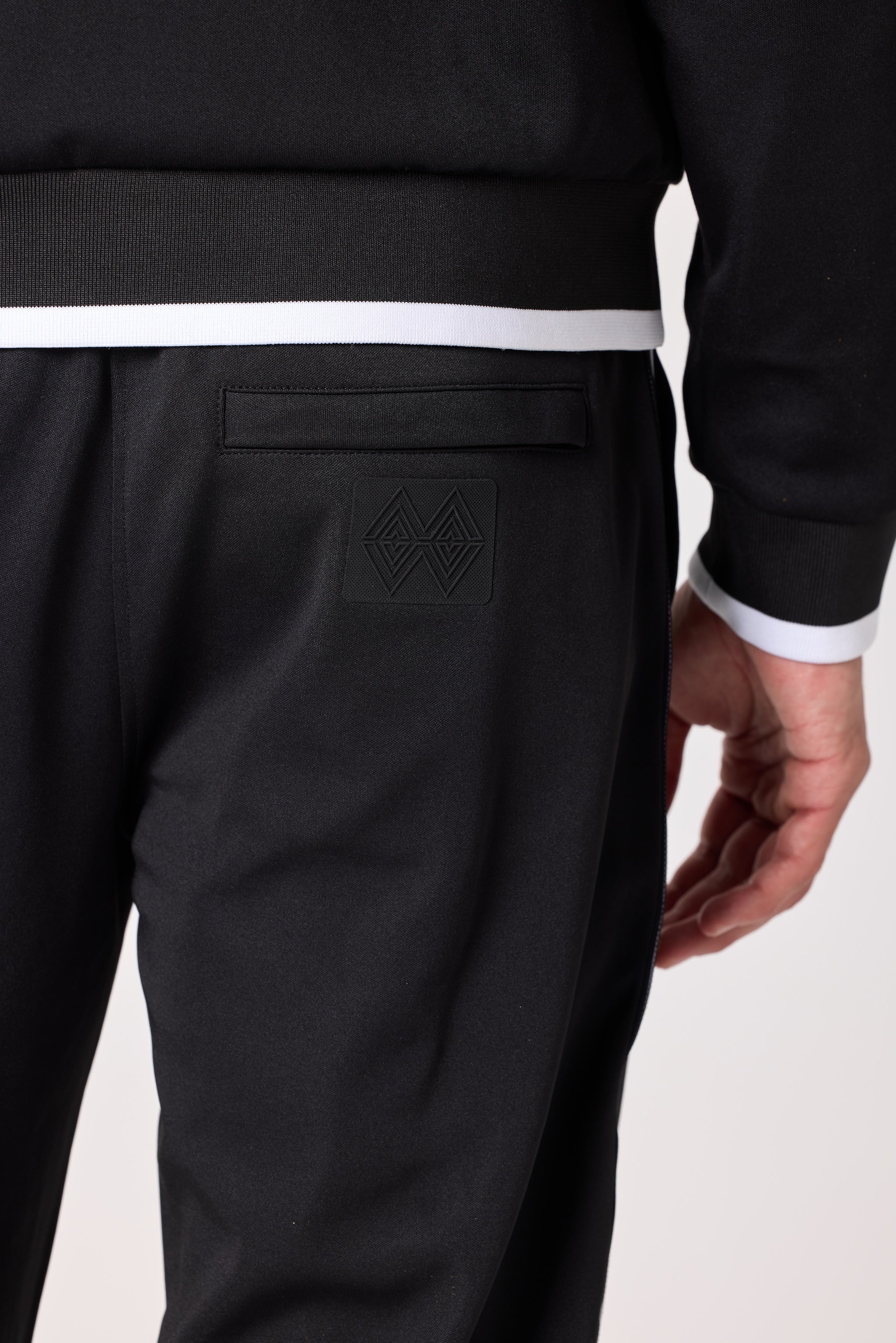 Double Black Après ‘83 Striped Track Pant in black back pocket