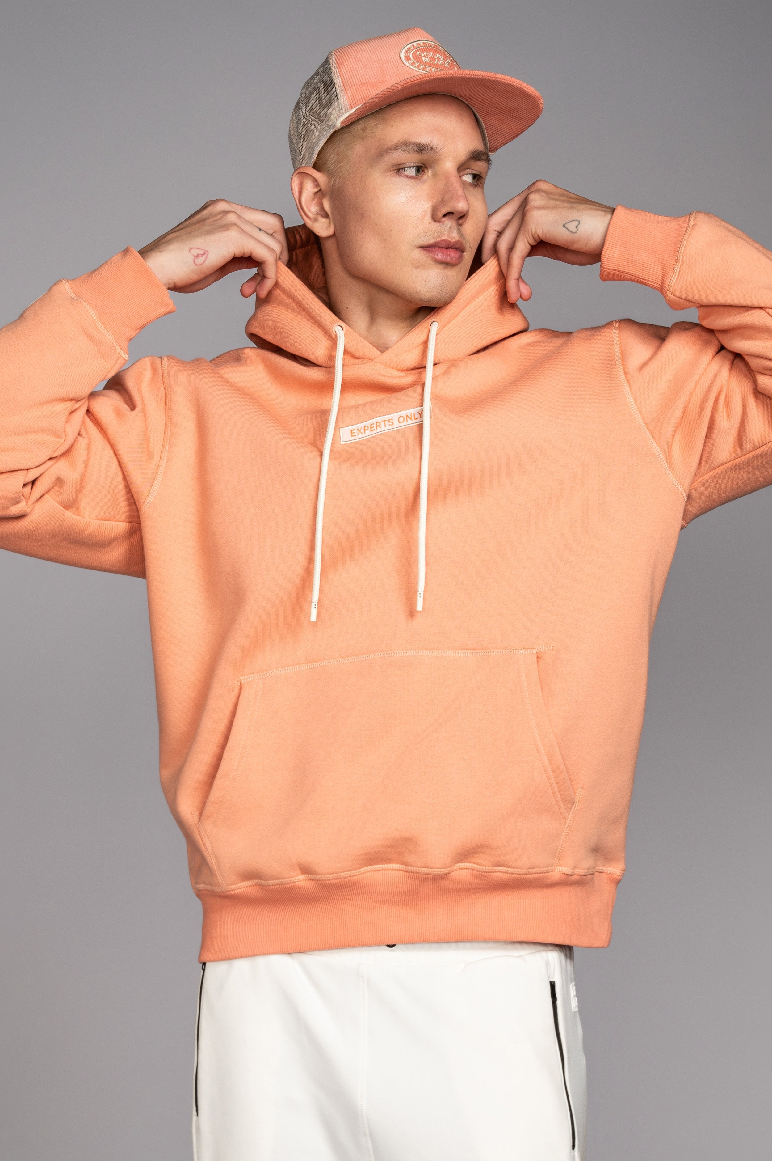 Streetwear styling of Double Black hoodie in Salmon 