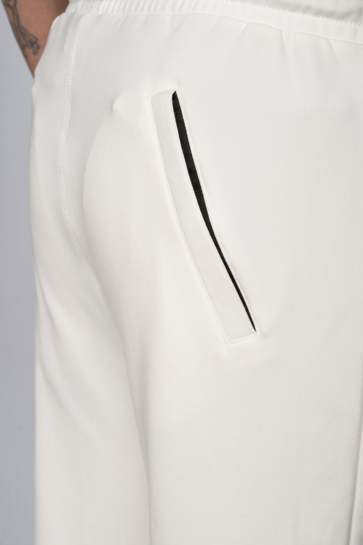 Double Black Tech Sweatpants in cream rear pocket