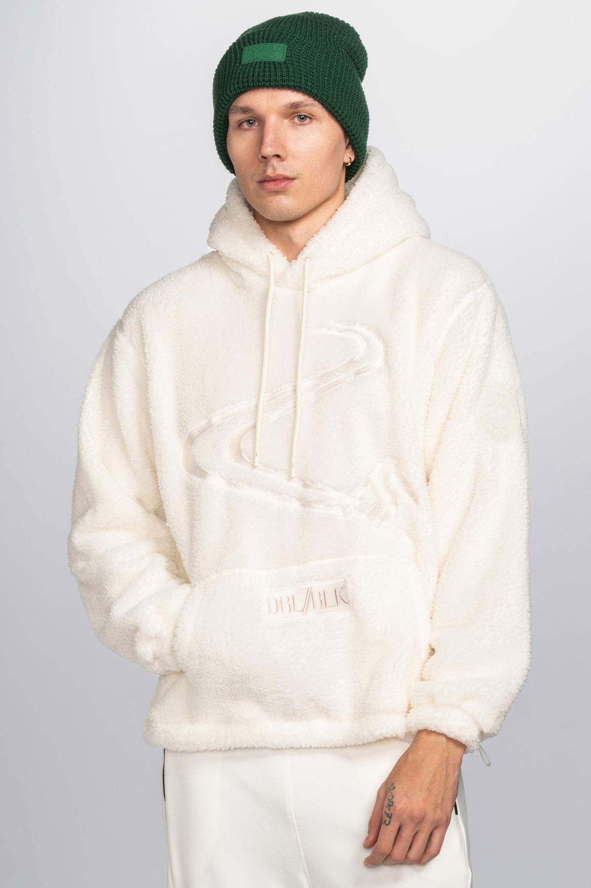 Double Black Sherpa Hoodie in white with skier graphic