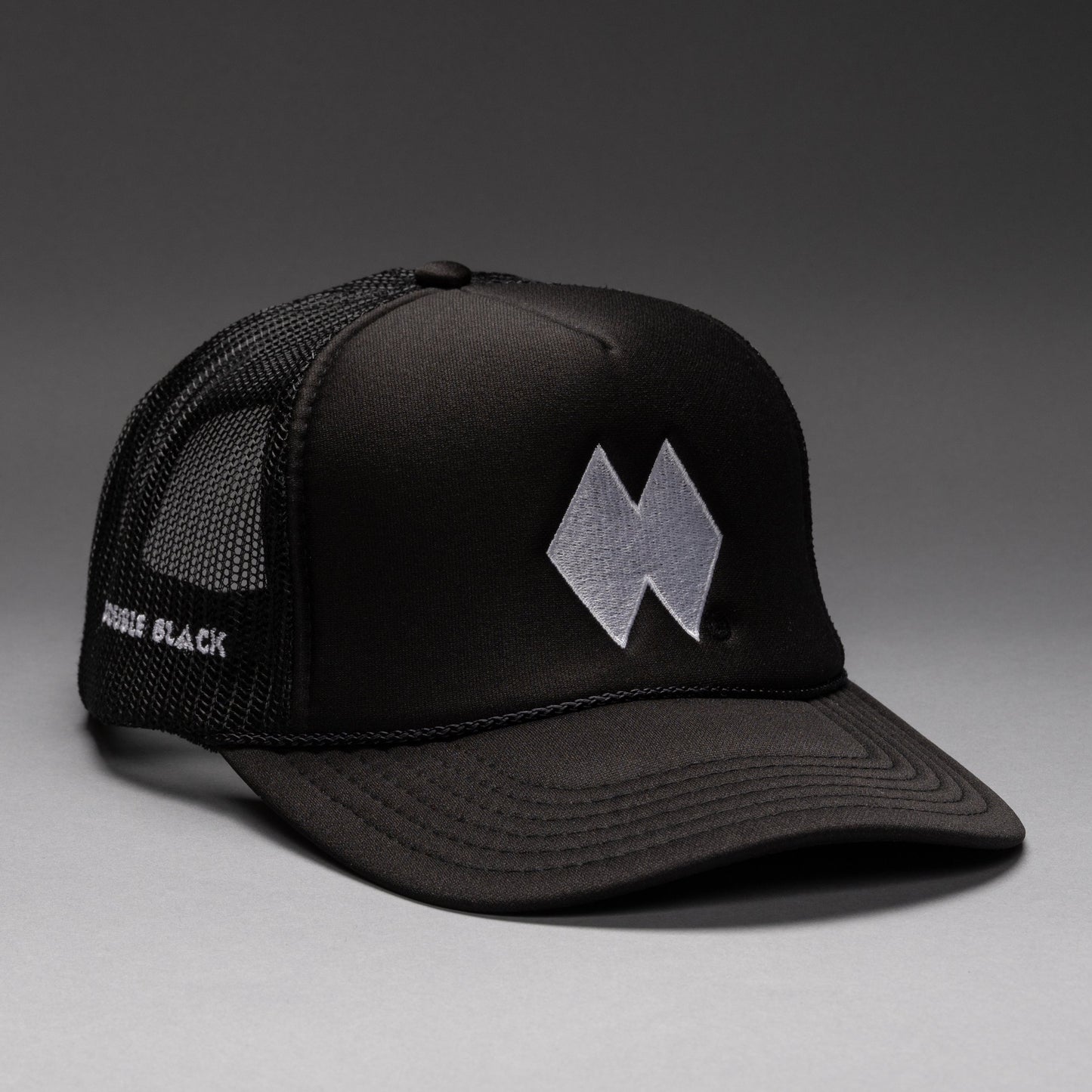 Black and white DBL Trucker