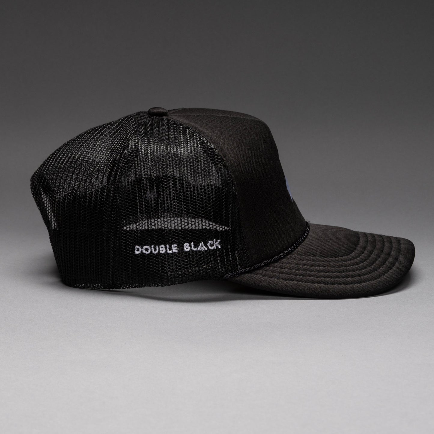 Black and white DBL Trucker
