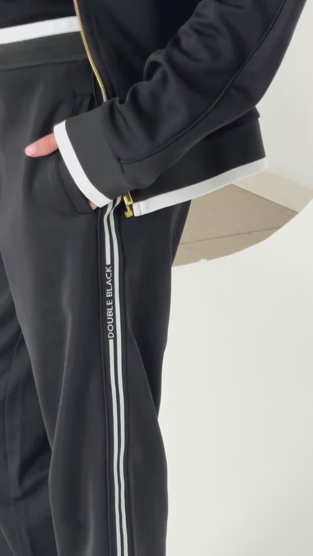 Double Black Après ‘83 Striped Track Pant in black